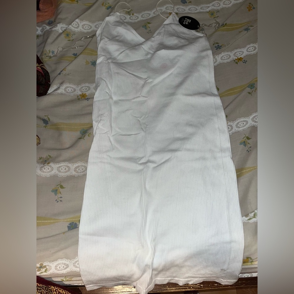 a white bodycon dress